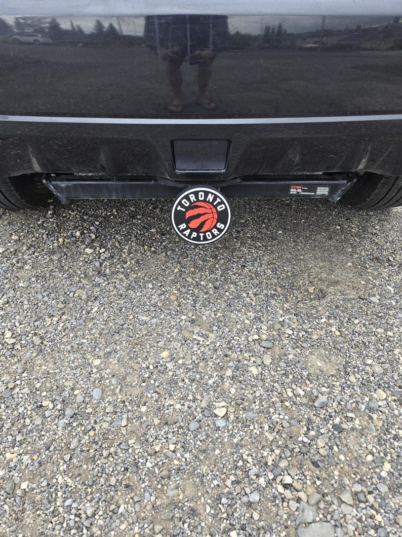 Toronto Raptors Hitch Cover – Durable Plastic Accessory with Free Hitch Pin | Perfect Gift for Basketball Fans