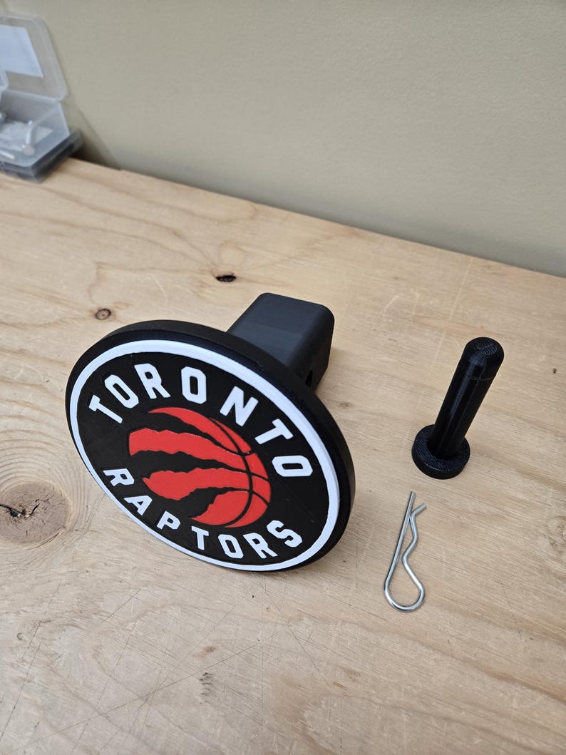 Toronto Raptors Hitch Cover – Durable Plastic Accessory with Free Hitch Pin | Perfect Gift for Basketball Fans